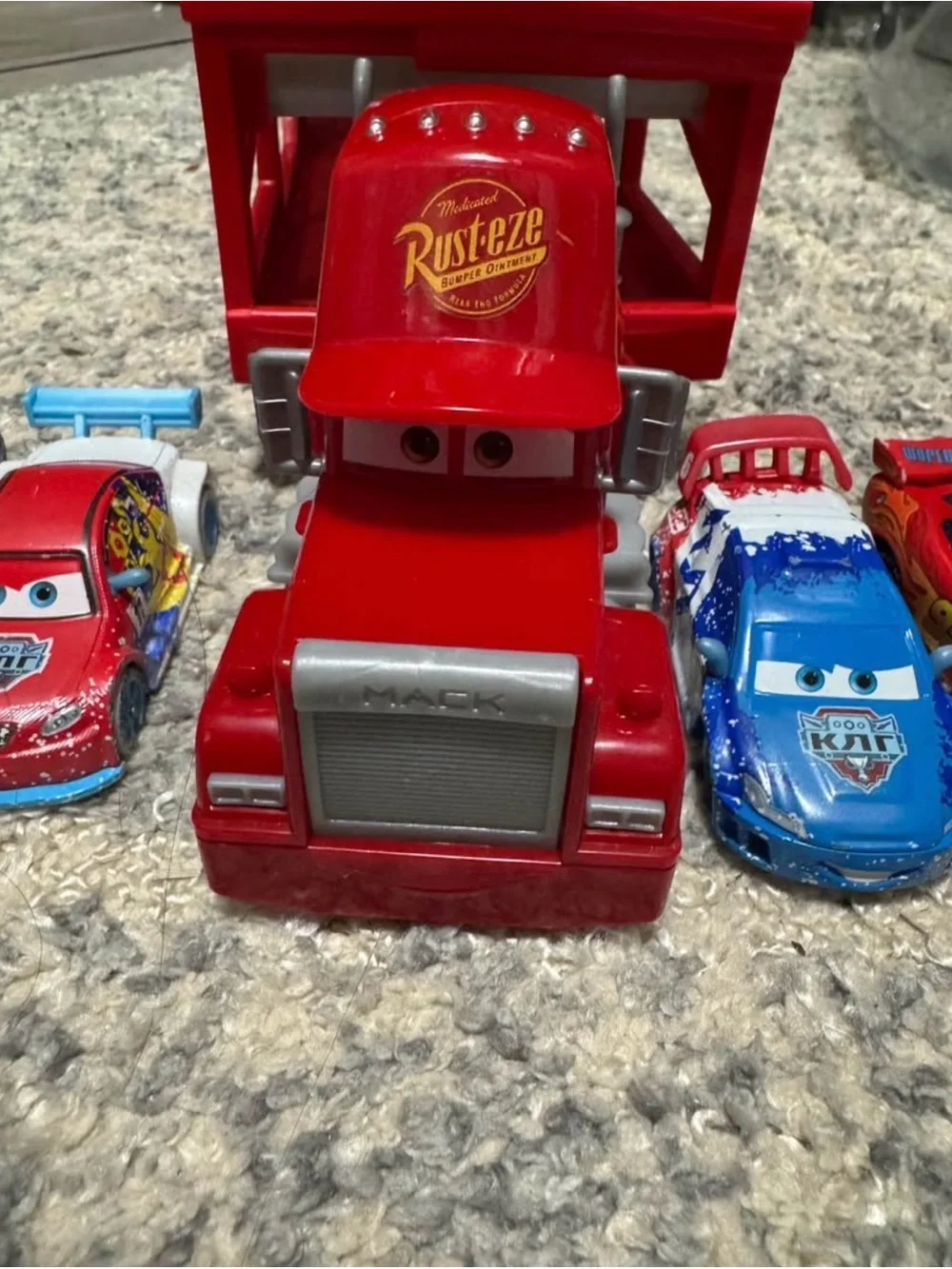 Disney Red Mack Truck Playset with Red, Blue, White, Green Cars